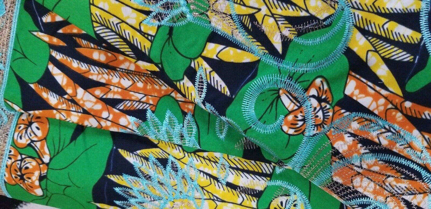 Green Multi Color African Print. Lace over Print Design ..$12.50 per yard