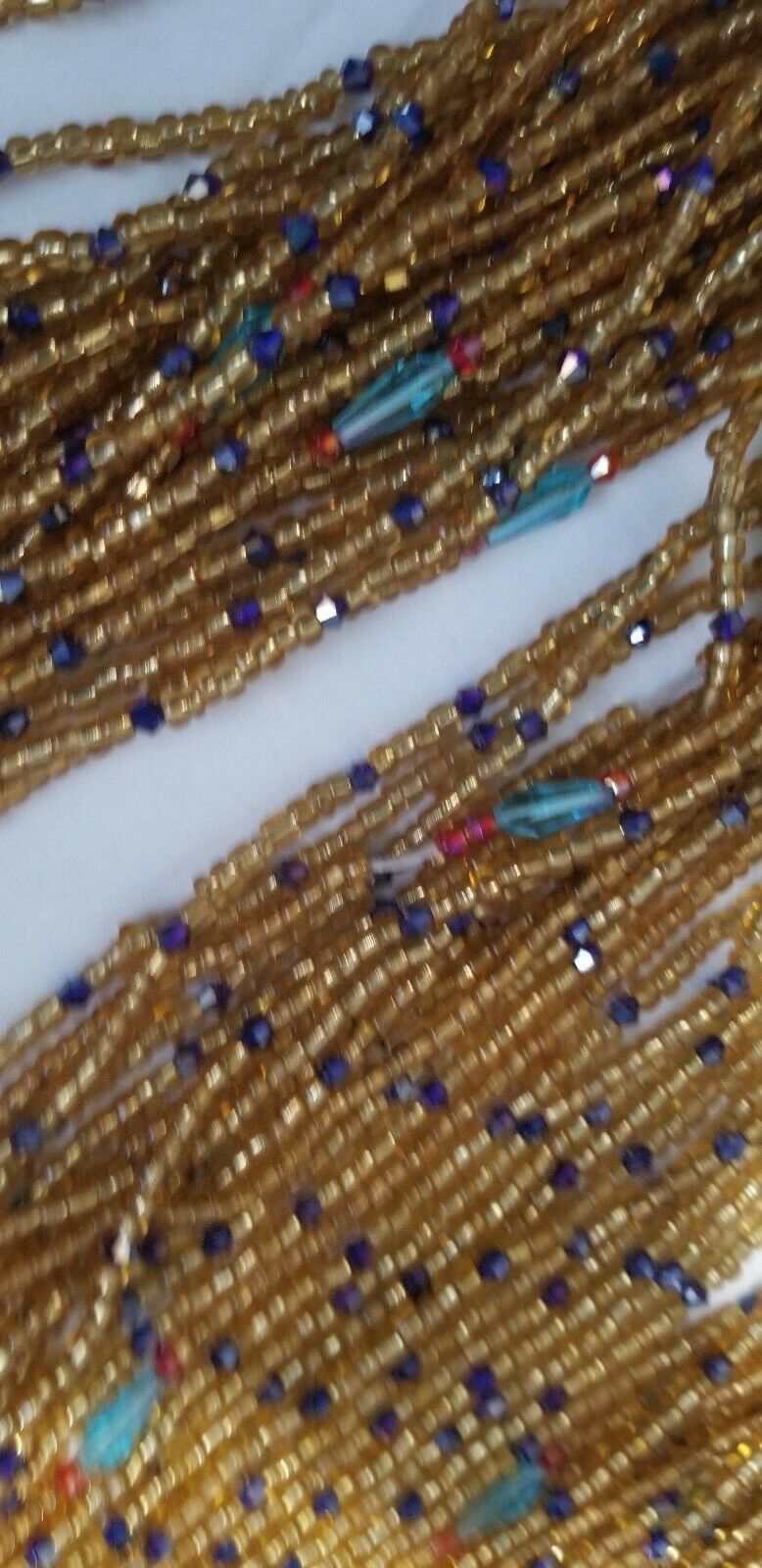 Amber Colored African waist Beads Long With Decorative Accents..46"-53"
