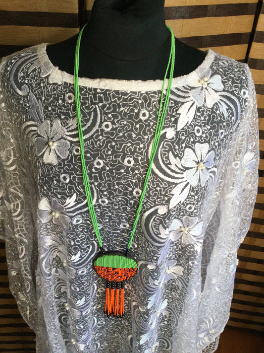 Long Strand beaded necklace with leather and beads pendant