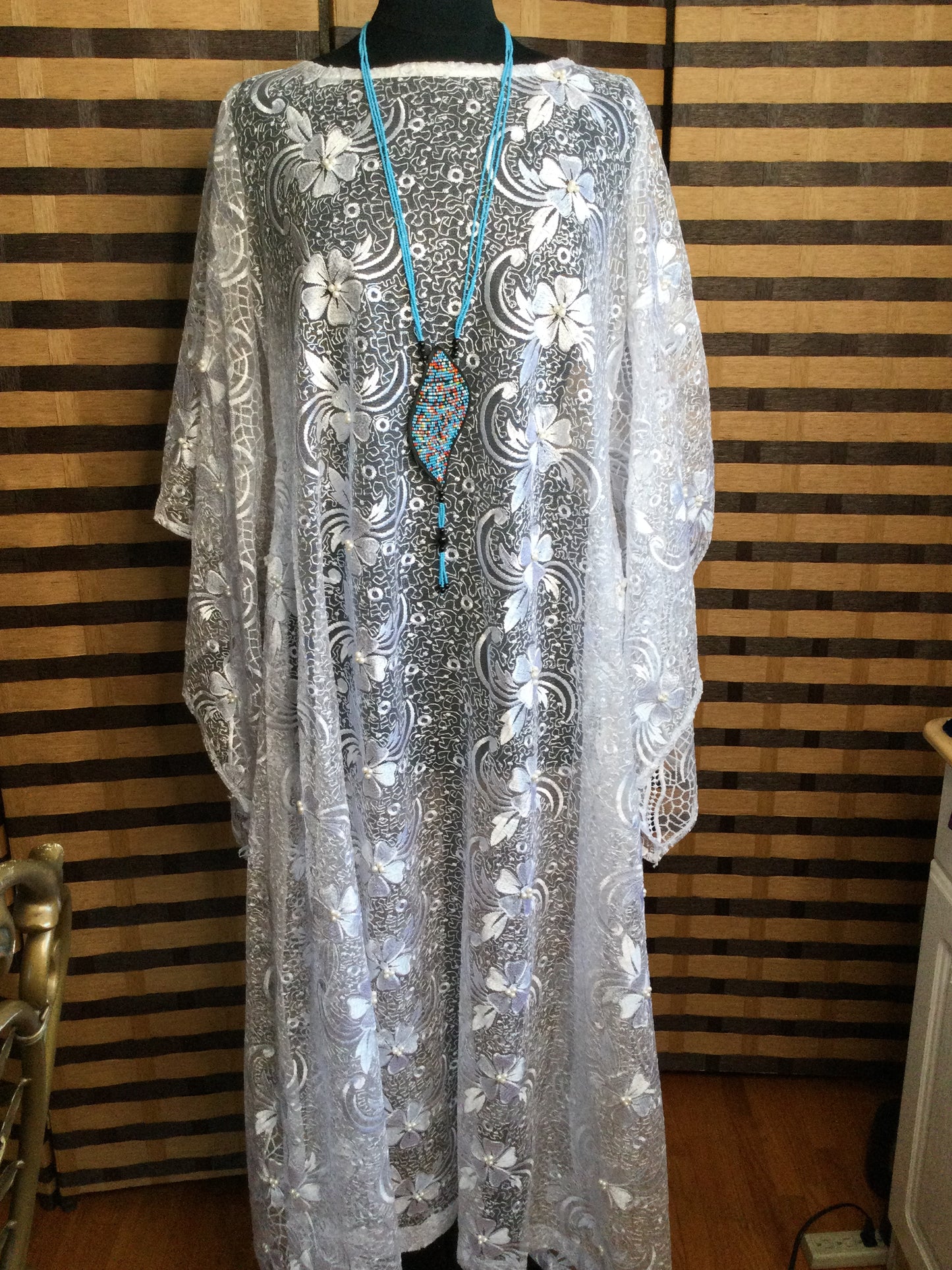 Long Strand beaded necklace with leather and beads pendant