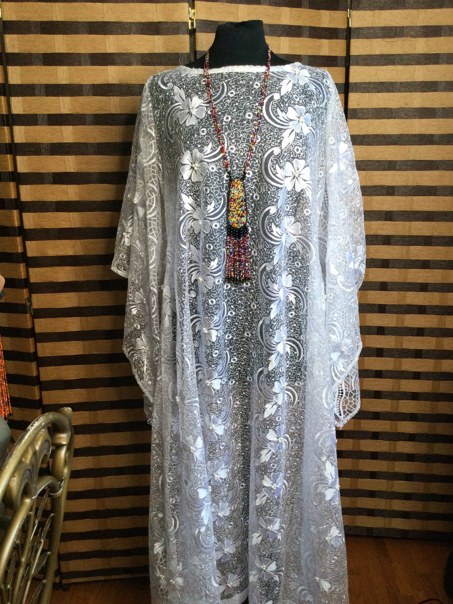 Long Strand beaded necklace with leather and beads pendant