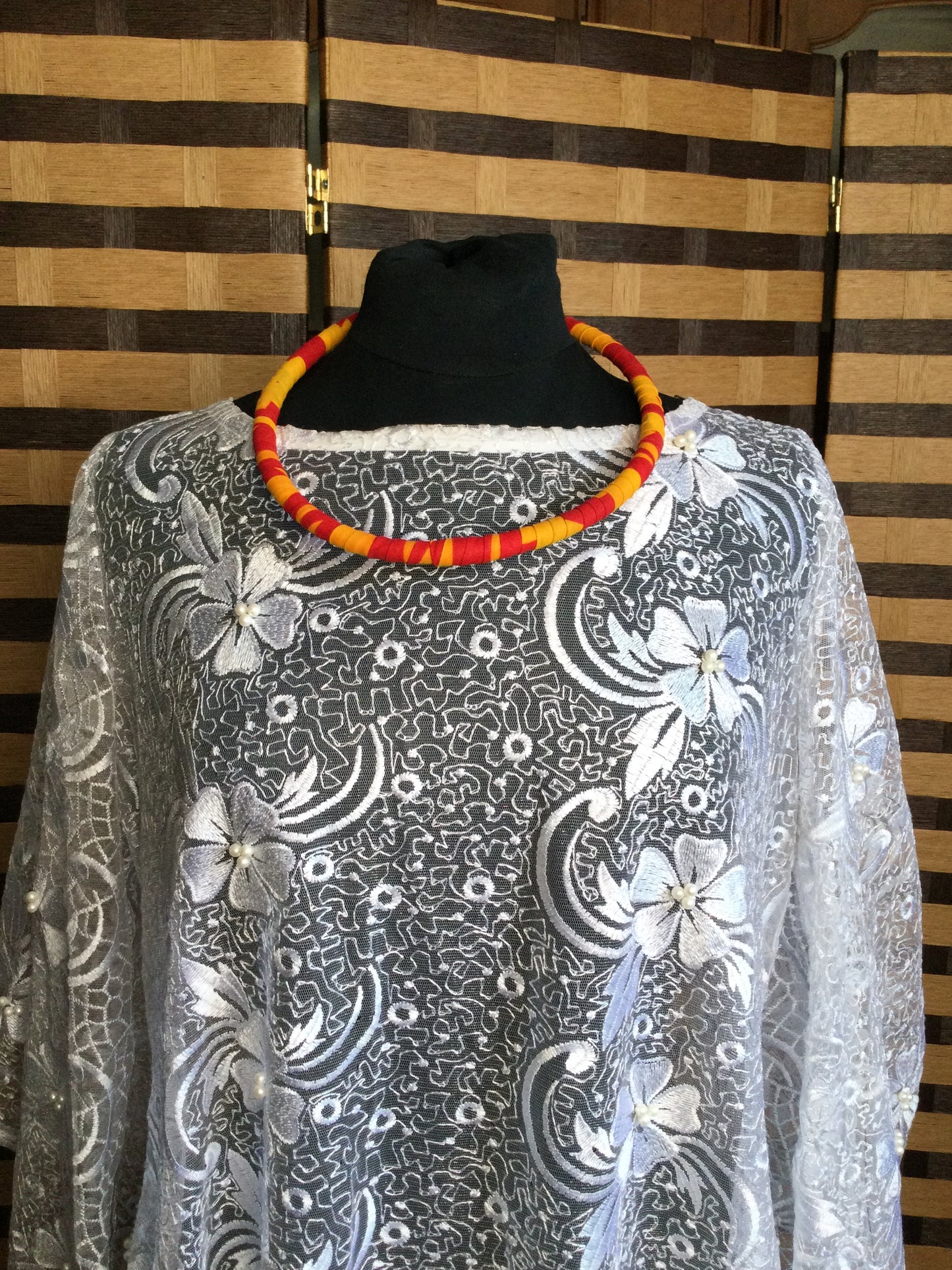 Long Strand beaded necklace with leather and beads pendant