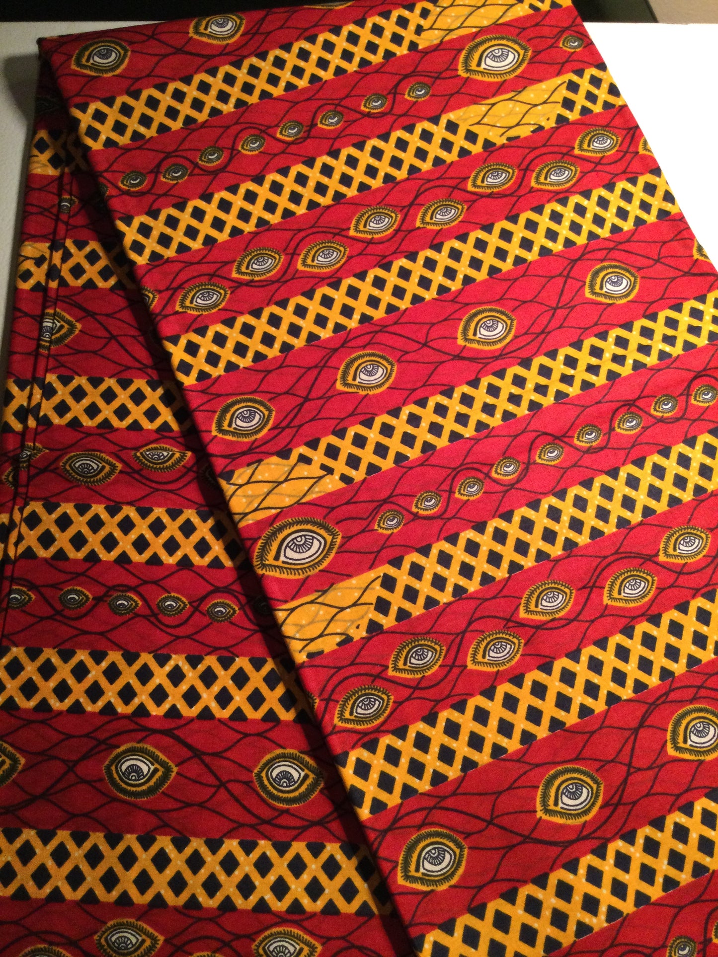 RED MULTI AFRICAN PRINT (EYE MOTIF)