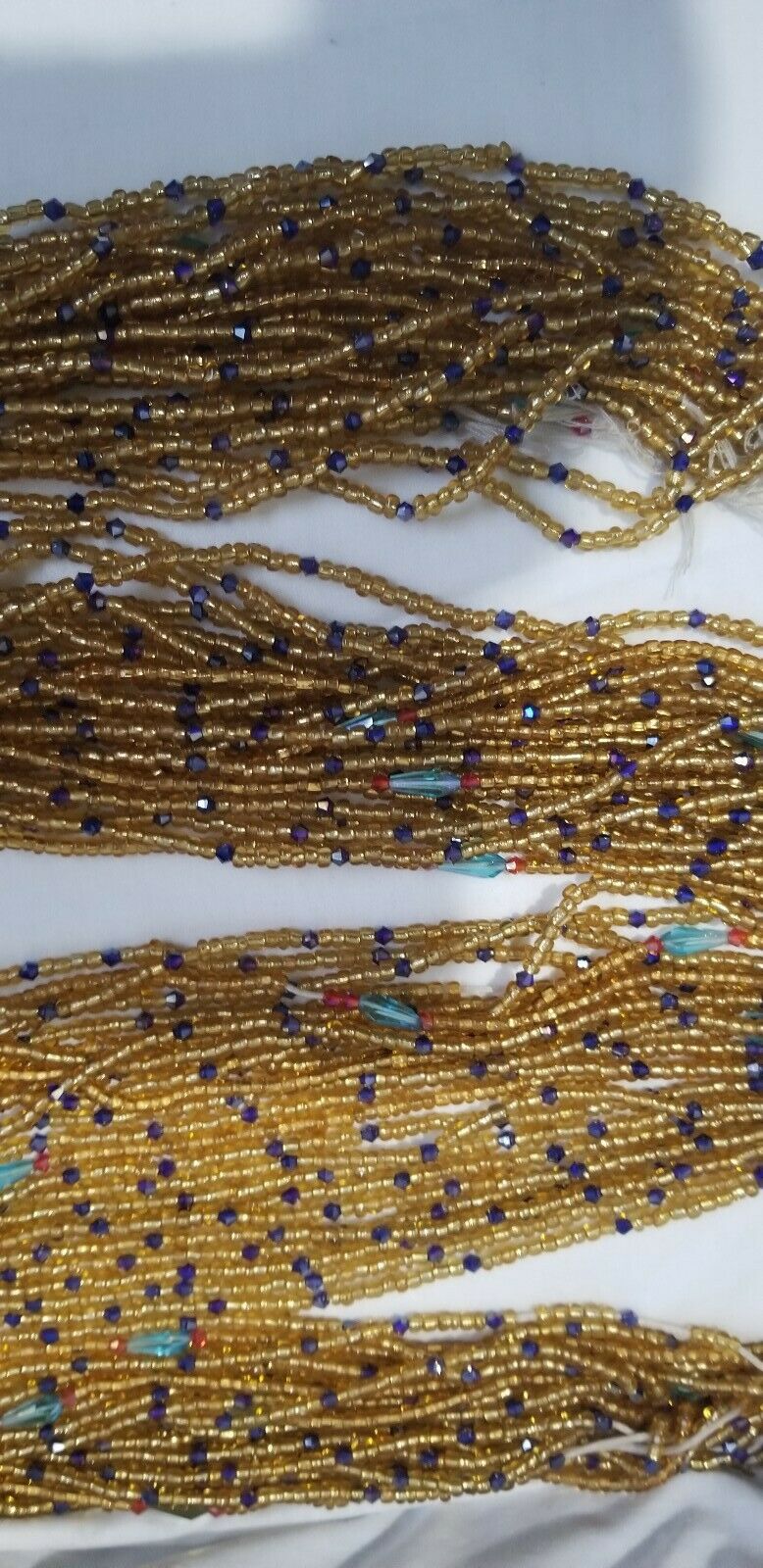 Amber Colored African waist Beads Long With Decorative Accents..46"-53"