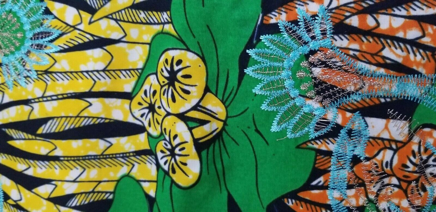 Green Multi Color African Print. Lace over Print Design ..$12.50 per yard