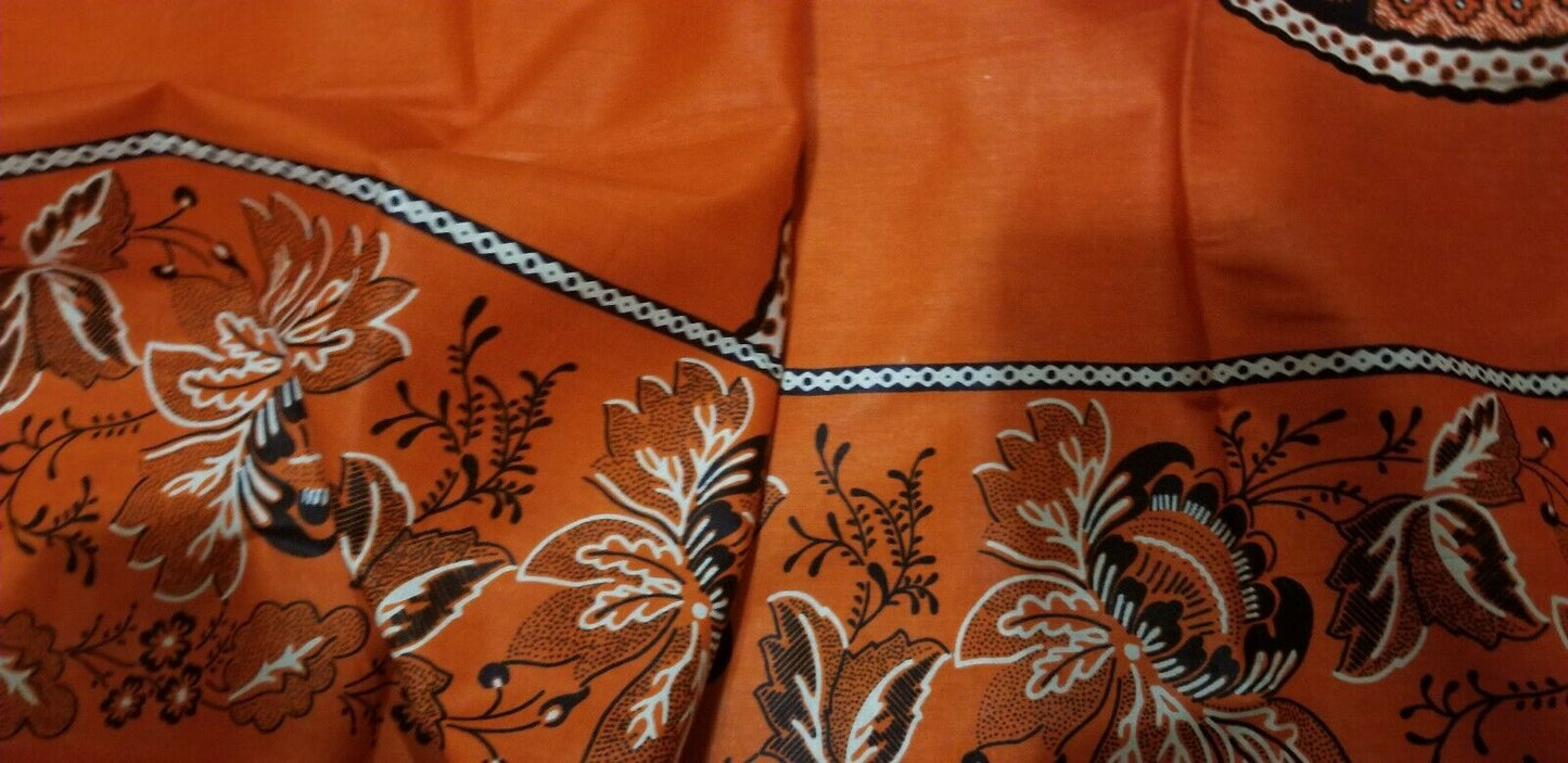 African Print With OrangeBackground And Bold Circular Motif Details 4yards