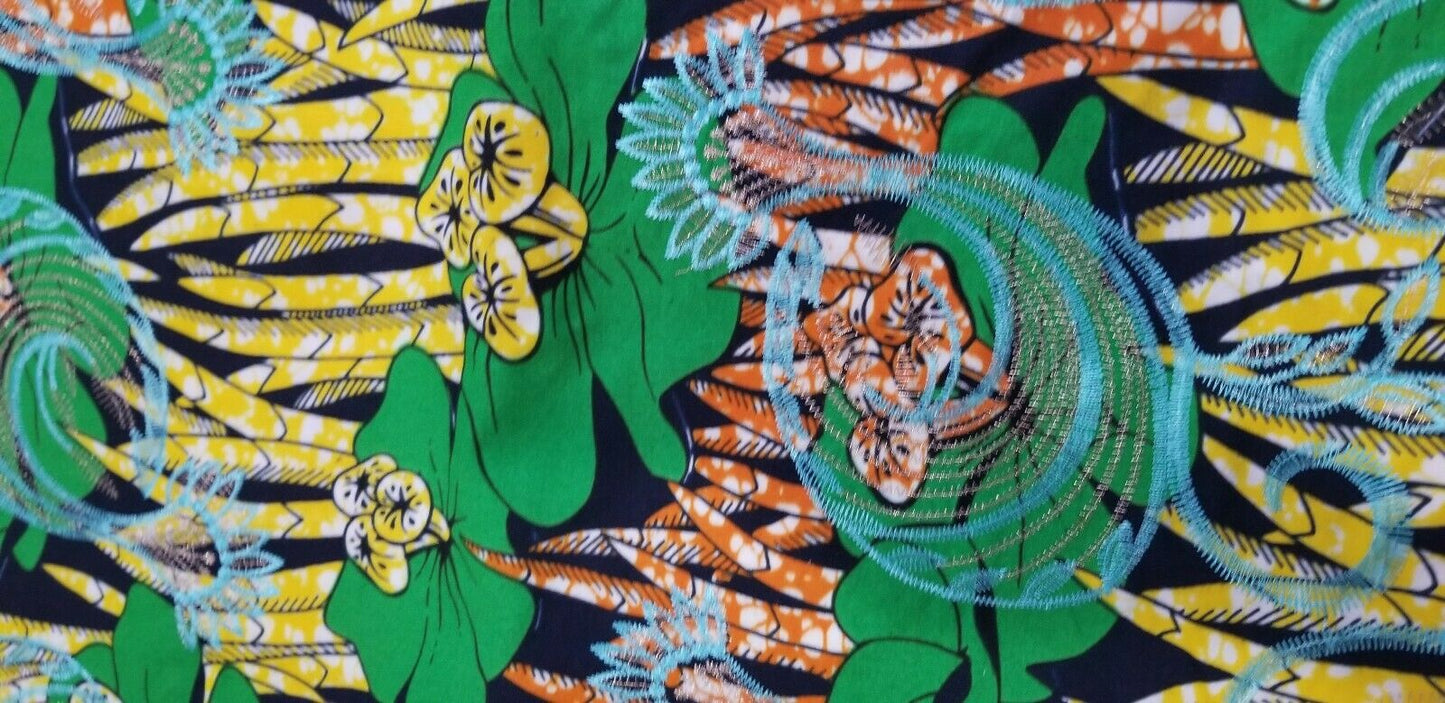 Green Multi Color African Print. Lace over Print Design ..$12.50 per yard